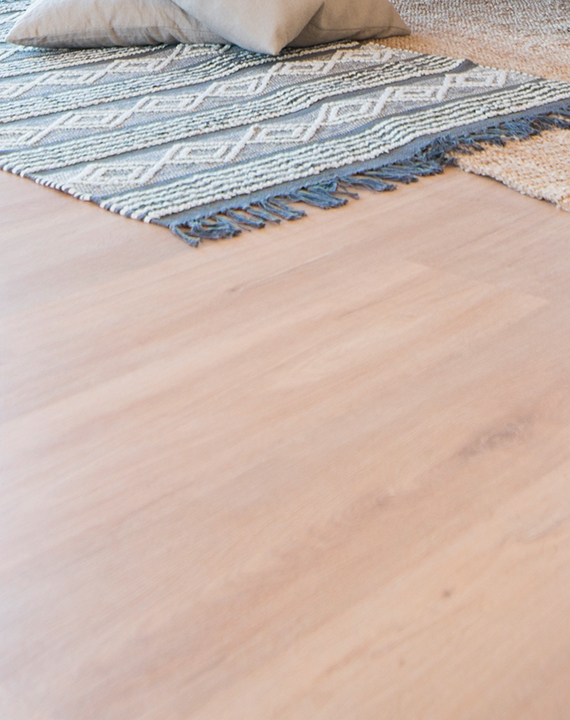 laminate flooring with blue area rug